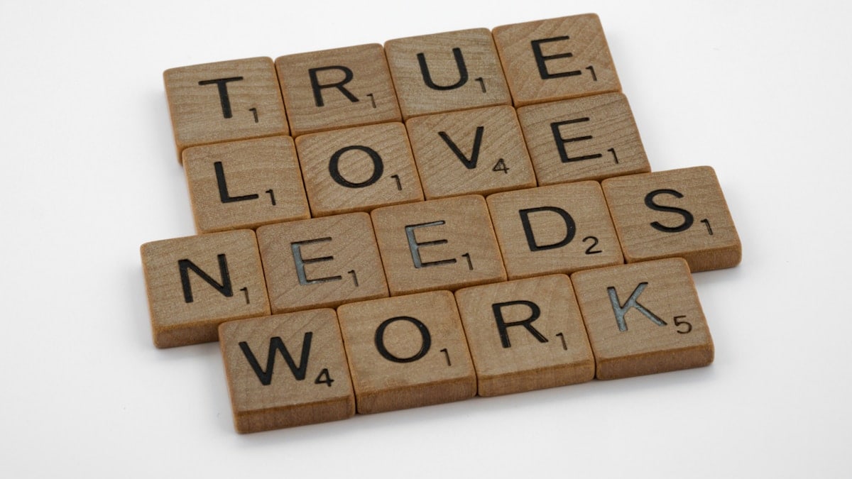 scrabble, scrabble pieces, lettering, letters, wood, scrabble tiles, white background, words, quote, letters, type, typography, design, layout, focus, bokeh, blur, photography, images, image, love, true love need work, work, commitment, relationship, effort, talk, listen, commit, engagement, marriage, partner,